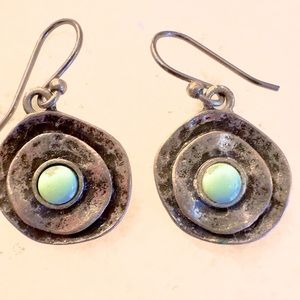 Silver earrings with turquoise colored stone